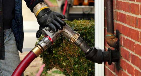 Home heating oil delivery at a residential property in East Patchogue, NY